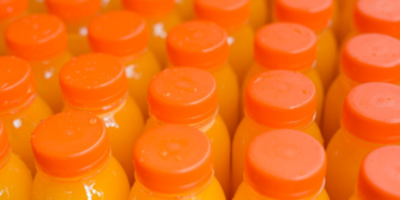 Tarifaço pode gerar impacto bilionário à cadeia brasileira de suco de laranja